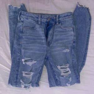 American Eagle Next Level Stretch Light Wash Ripped High Waisted Jeggings